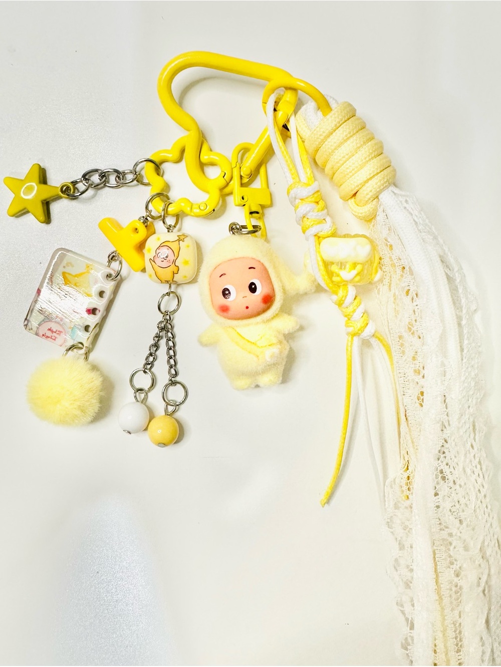 Twinkle Charm Keychain with Tassel and Pom-Pom Accent